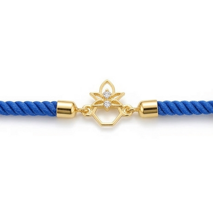 Blue rope men's diamond bracelet with an 18kt gold Kalash-shaped floral charm under Rs. 15,000