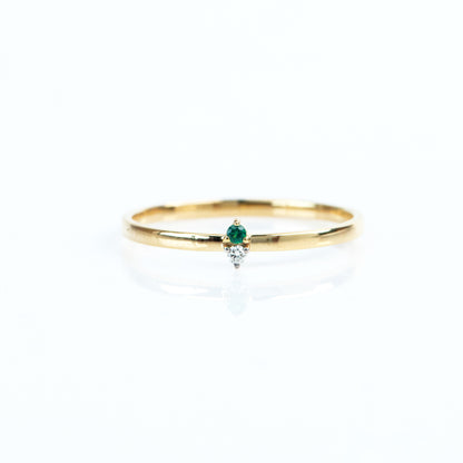 Caratly 18kt gold Emerald Basic Ring with green emerald and 0.01ct diamond accent on a thin minimalist band under Rs. 15,000