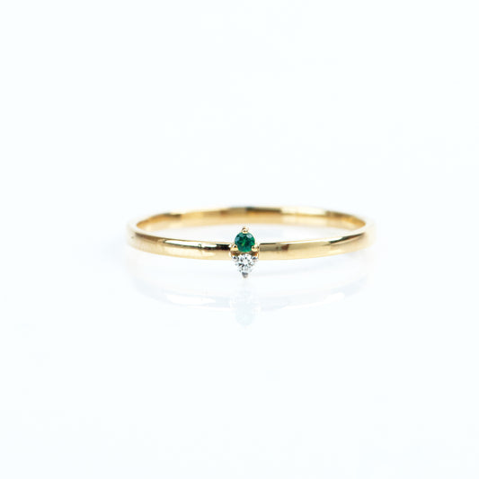 Caratly 18kt gold Emerald Basic Ring with green emerald and 0.01ct diamond accent on a thin minimalist band under Rs. 15,000