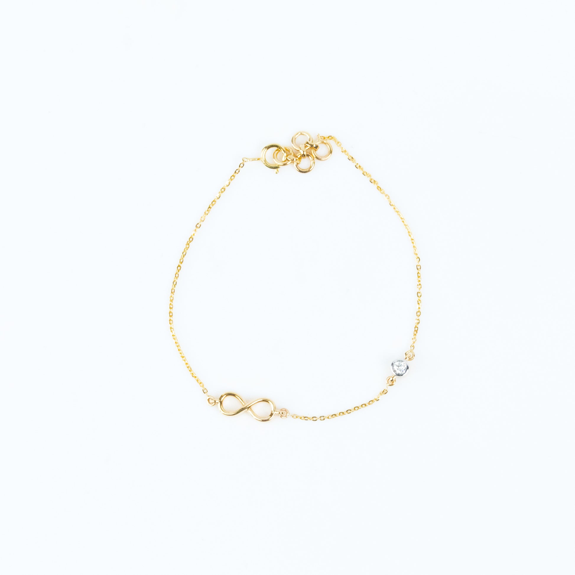 Caratly 18kt gold Infinity Diamond Bracelet with 0.06ct diamond station design for women 1.61g under Rs. 40,000