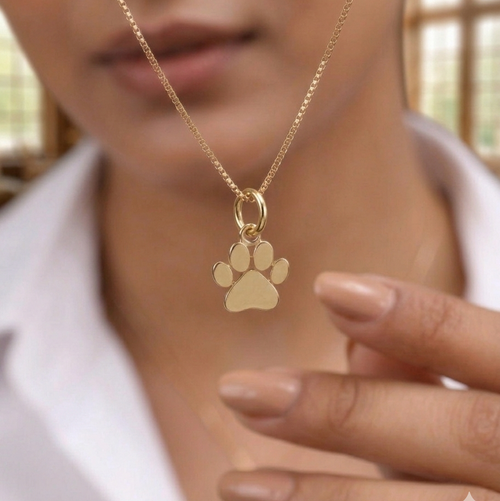 Caratly 18kt gold Paw Gold Pendant featuring a small, polished solid gold paw print charm on a delicate chain under Rs. 15,000