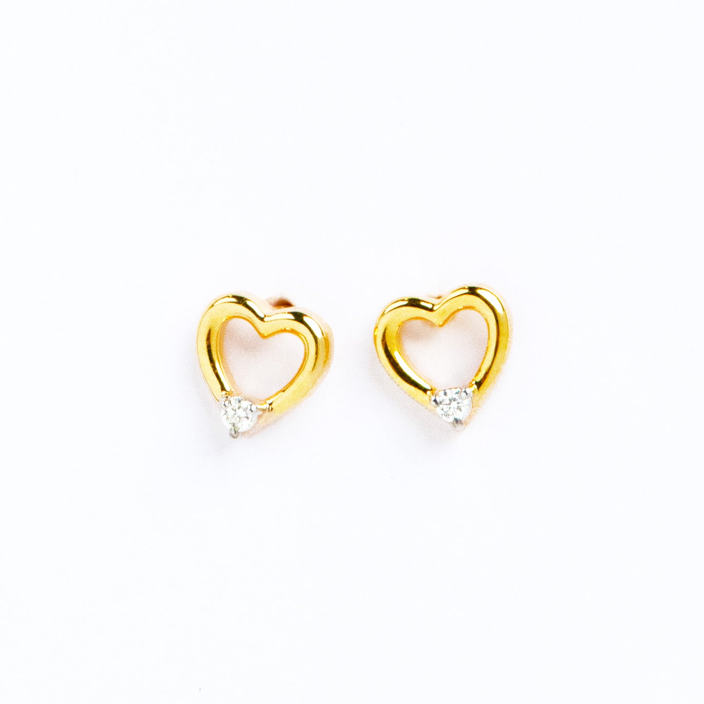 Caratly 18kt gold Heart-Stud Earring with 0.02ct diamond accent in a minimalist open heart silhouette, minimal affordable gifts for her under Rs. 20,000