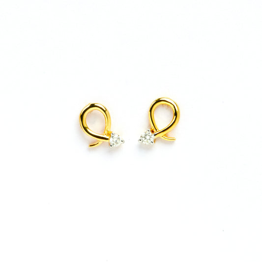 Caratly 18kt gold Loop Diamond Earring with 0.06ct diamond accent in a twisted gold wire loop design, minimal luxury gifts under Rs. 30,000