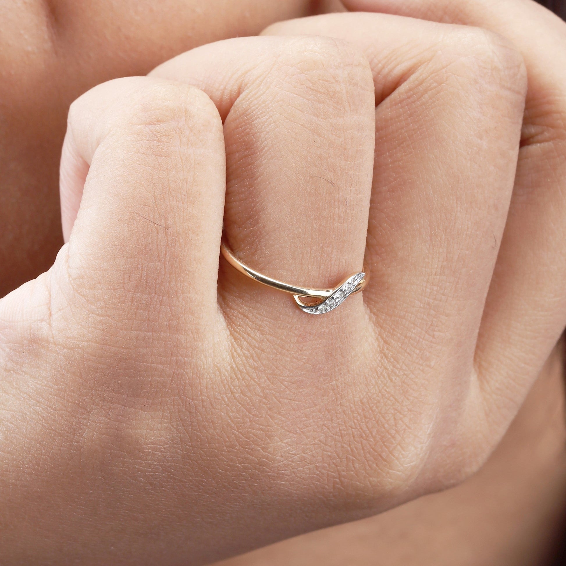 Caratly 18kt gold S Diamond Ring with 0.04ct diamond pave in a gentle S-wave band design under 20,000