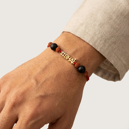 Gold #Bhai Diamond Rakhi with black and Rudraksha beads.
