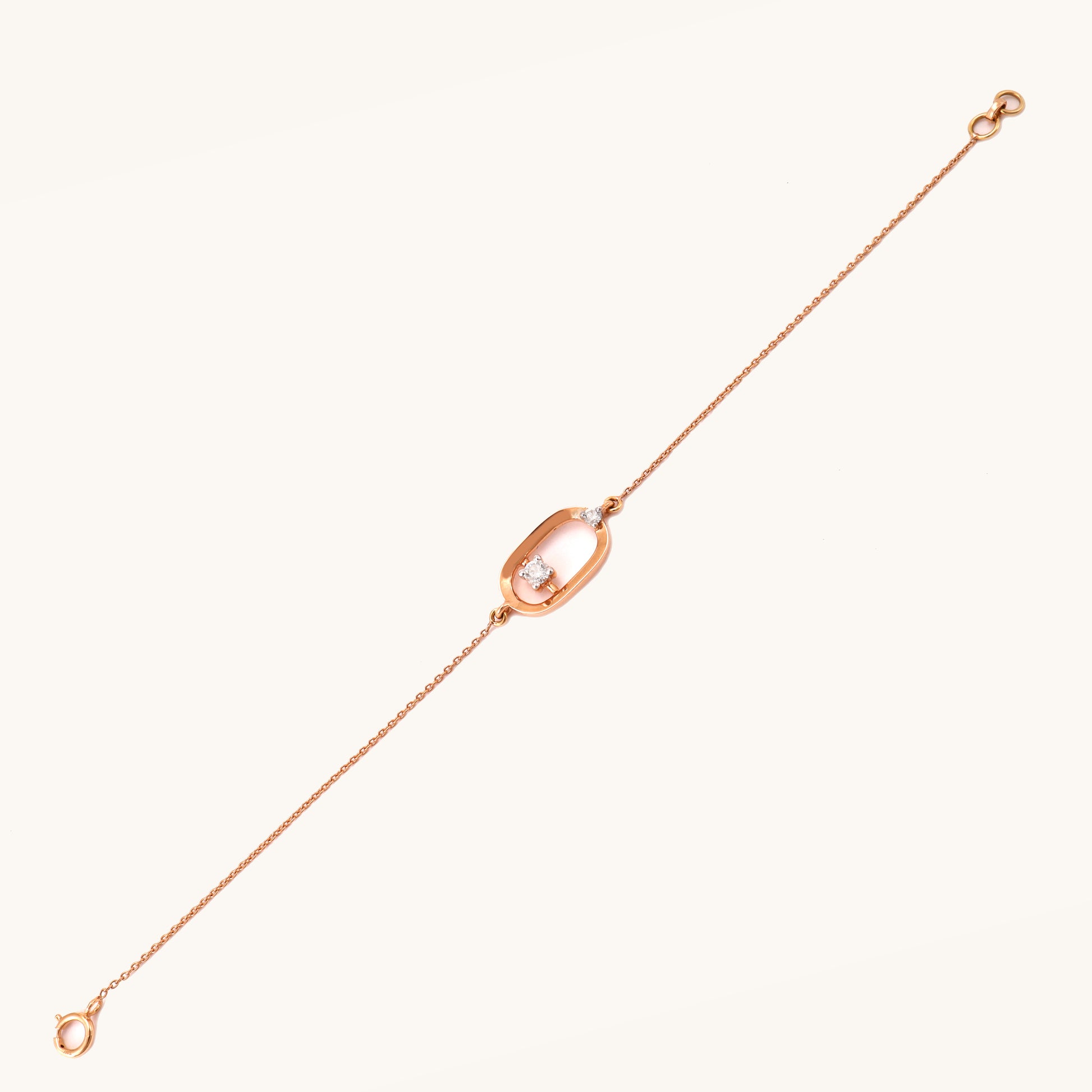 Caratly 18kt gold Encircle Diamond Bracelet featuring an elongated open oval link with a single floating diamond in the center and side accents. Best everyday jewellery gift for her under Rs. 45,000