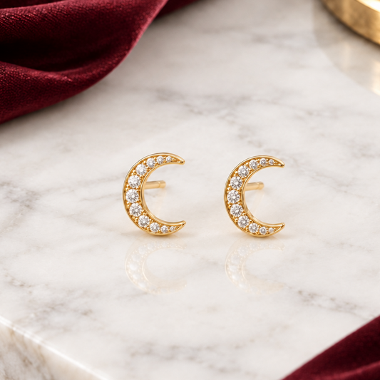 Gold crescent moon stud earrings fully paved with sparkling diamonds priced under Rs. 30,000