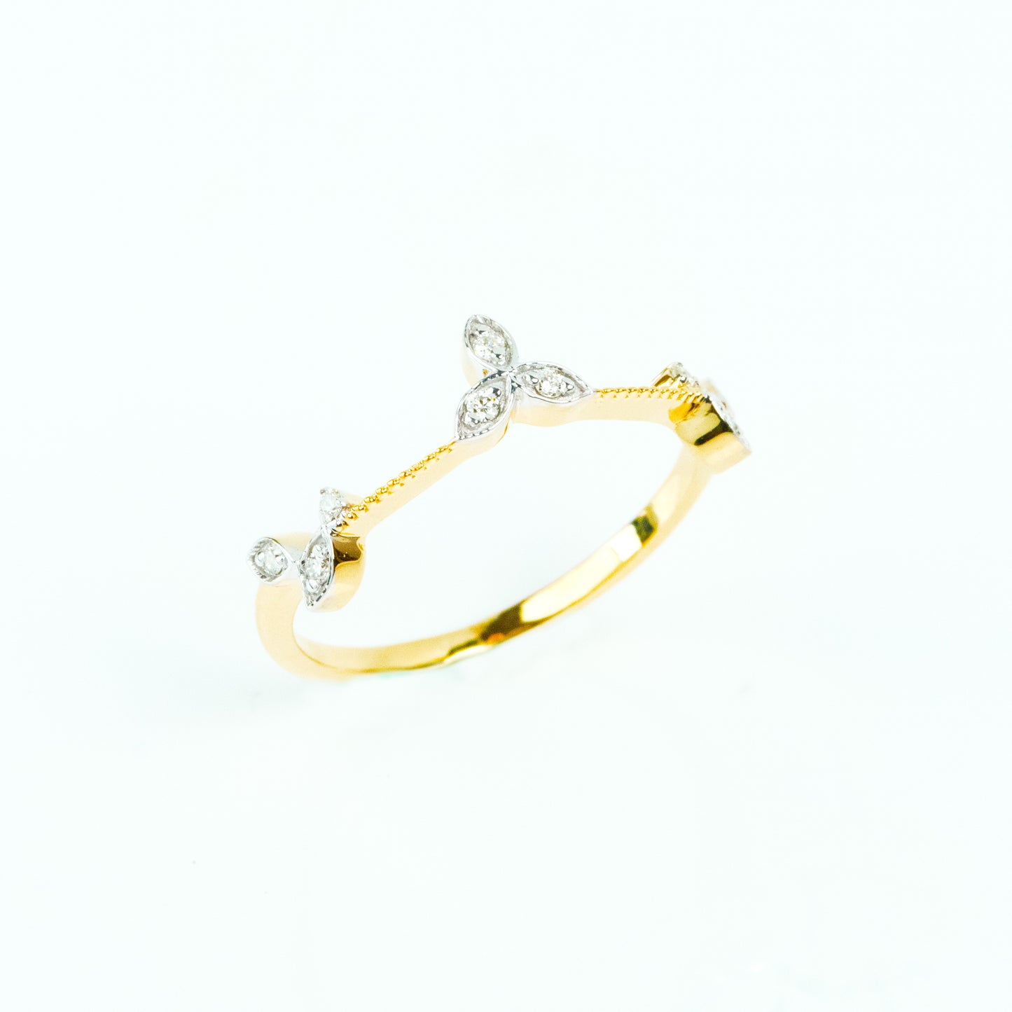 Caratly 18kt gold Entwined Flower Ring with three diamond floral clusters and textured vine band design, a minimal gift for her under 30,000