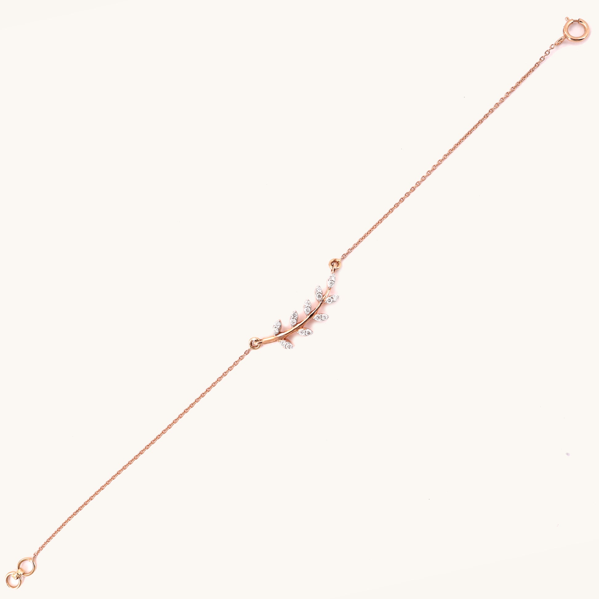 Caratly 18kt gold Fern Diamond Bracelet featuring a curved botanical branch with leaves set with pave diamonds. A minimal gift for her Under Rs. 40,000