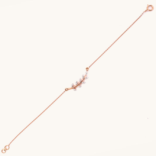 Caratly 18kt gold Fern Diamond Bracelet featuring a curved botanical branch with leaves set with pave diamonds. A minimal gift for her Under Rs. 40,000