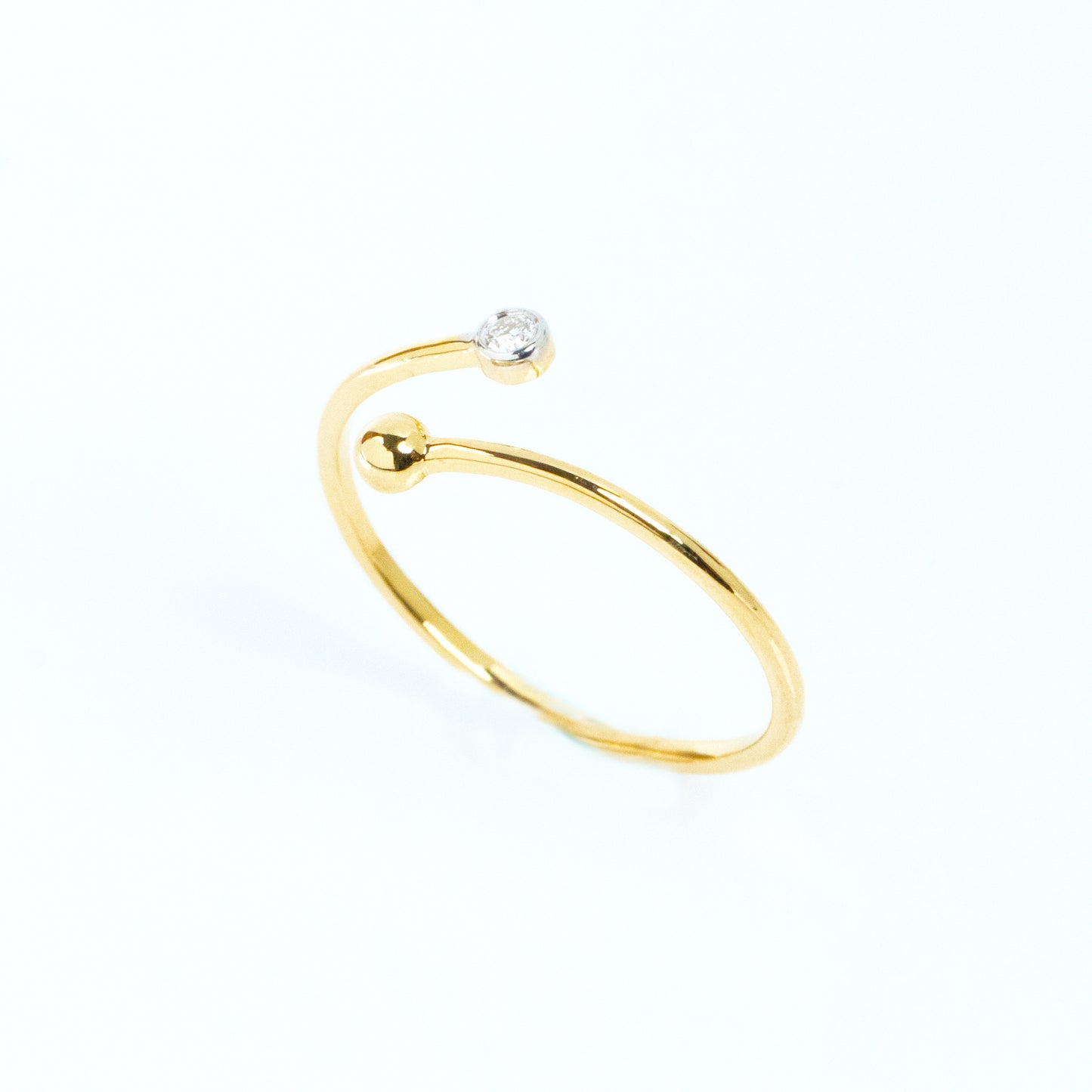 Caratly 18kt gold Crossover Diamond Ring with 0.03ct diamond and gold bead open bypass design under Rs. 15,000