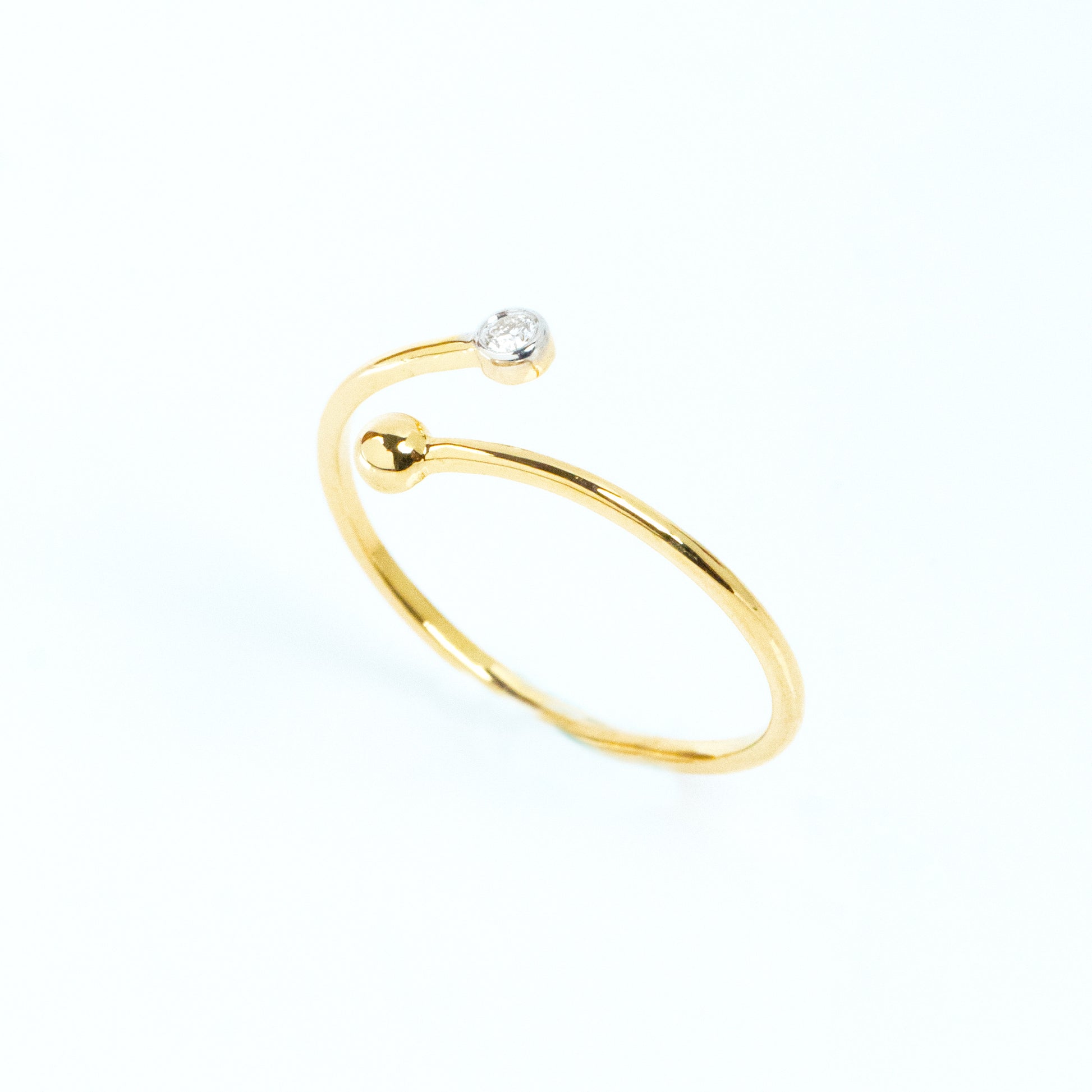 Caratly 18kt gold Crossover Diamond Ring with 0.03ct diamond and gold bead open bypass design under Rs. 15,000