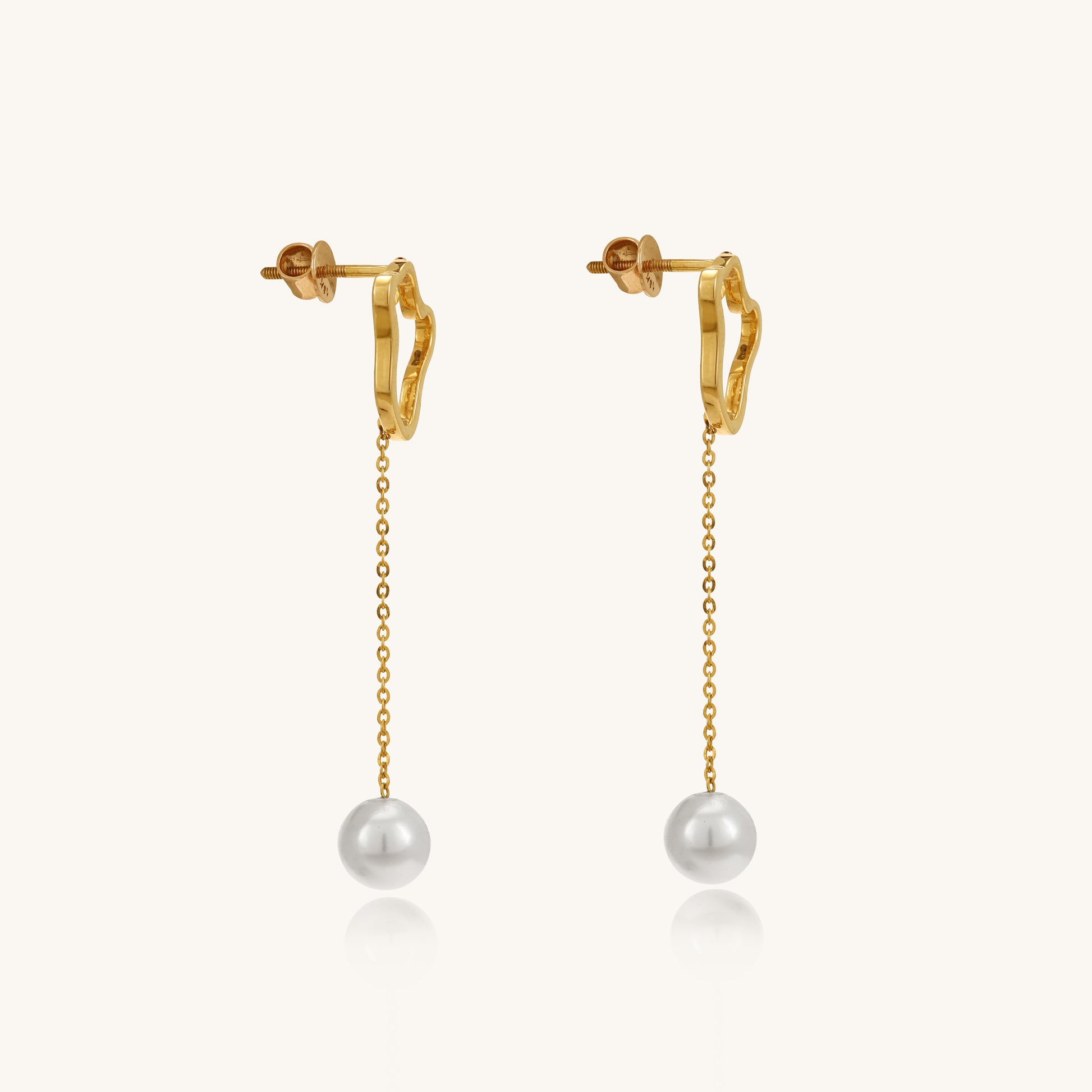 Caratly 18kt gold Pearl Dangling Earring featuring an abstract open gold shape at the lobe with a delicate dangling chain holding a single pearl drop under Rs. 40,000
