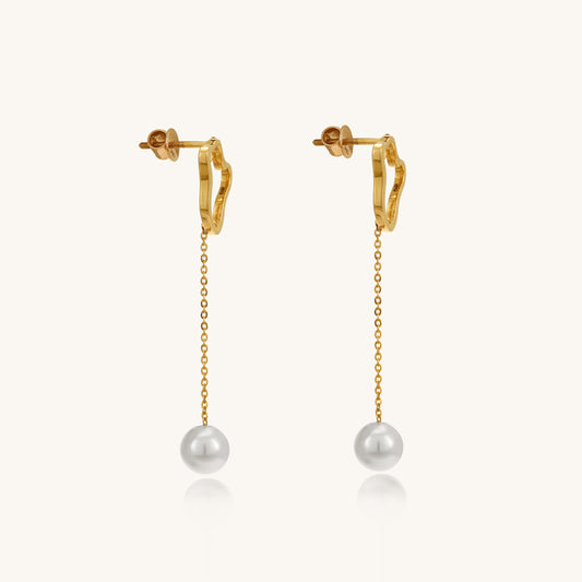 Caratly 18kt gold Pearl Dangling Earring featuring an abstract open gold shape at the lobe with a delicate dangling chain holding a single pearl drop under Rs. 40,000