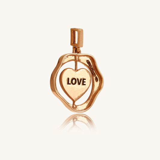 Caratly 18kt gold Love Gold Pendant featuring an organic wavy outer ring and a spinning inner circle engraved with the word LOVE under Rs. 50,000