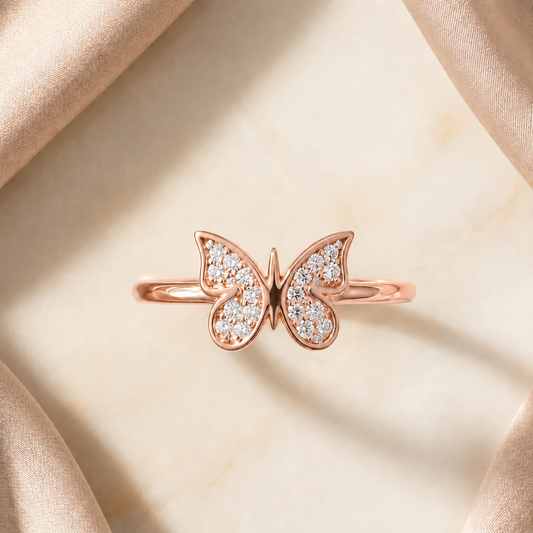 Rose gold ring shaped like a butterfly, fully paved with sparkling diamonds. Minimal gifts for her under Rs. 30,000