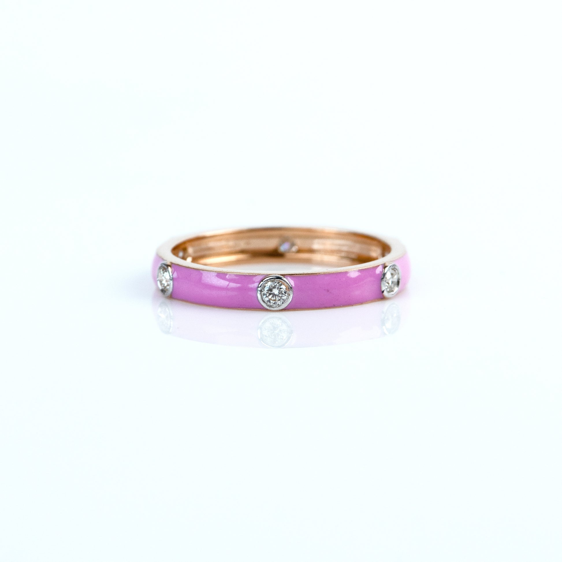 Caratly 18kt gold Pink Band Ring with pink enamel surface and 0.17ct flush set diamond accents under 50,000
