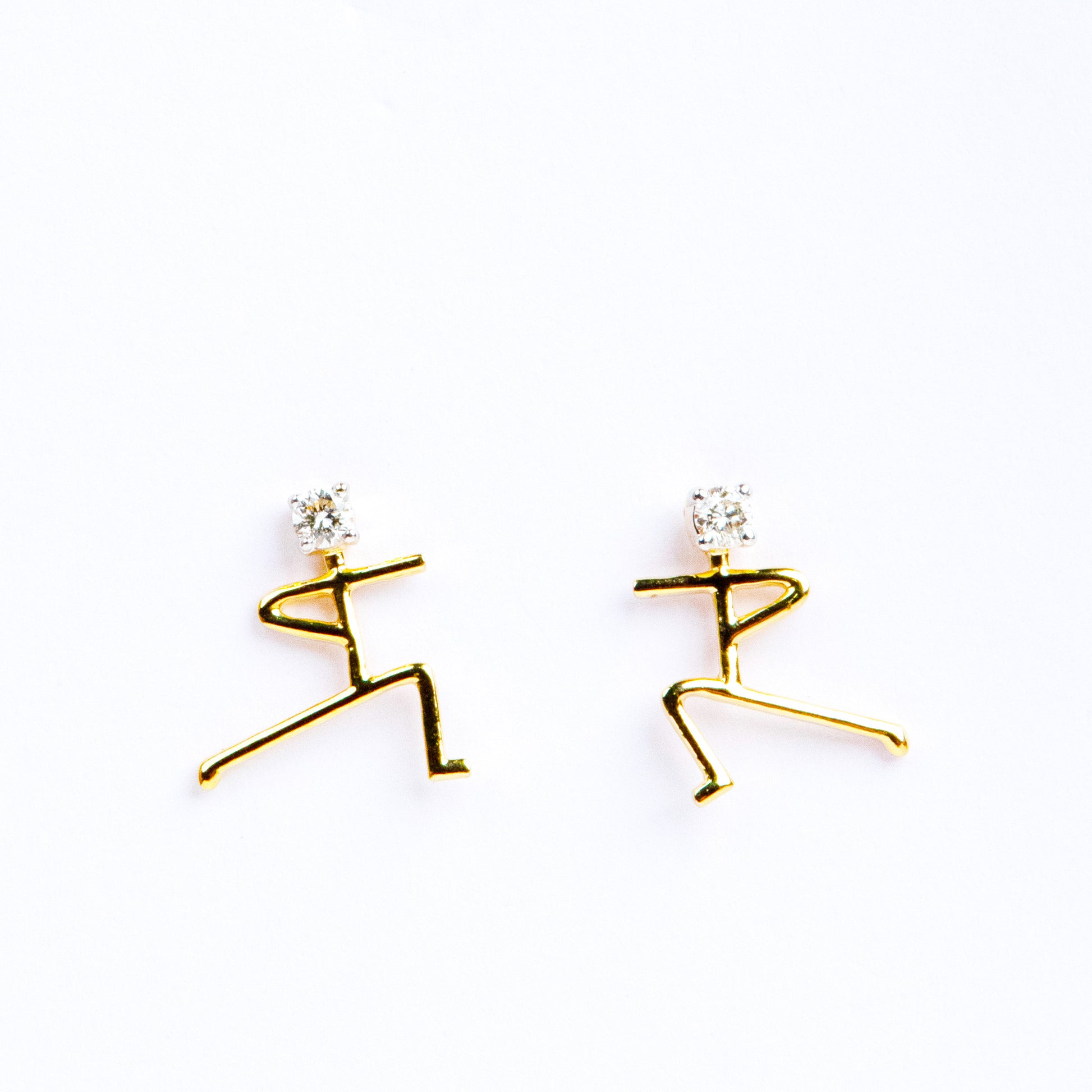 Caratly 18kt gold Human Diamond Earring with 0.10ct diamond accents in an abstract stick figure person design