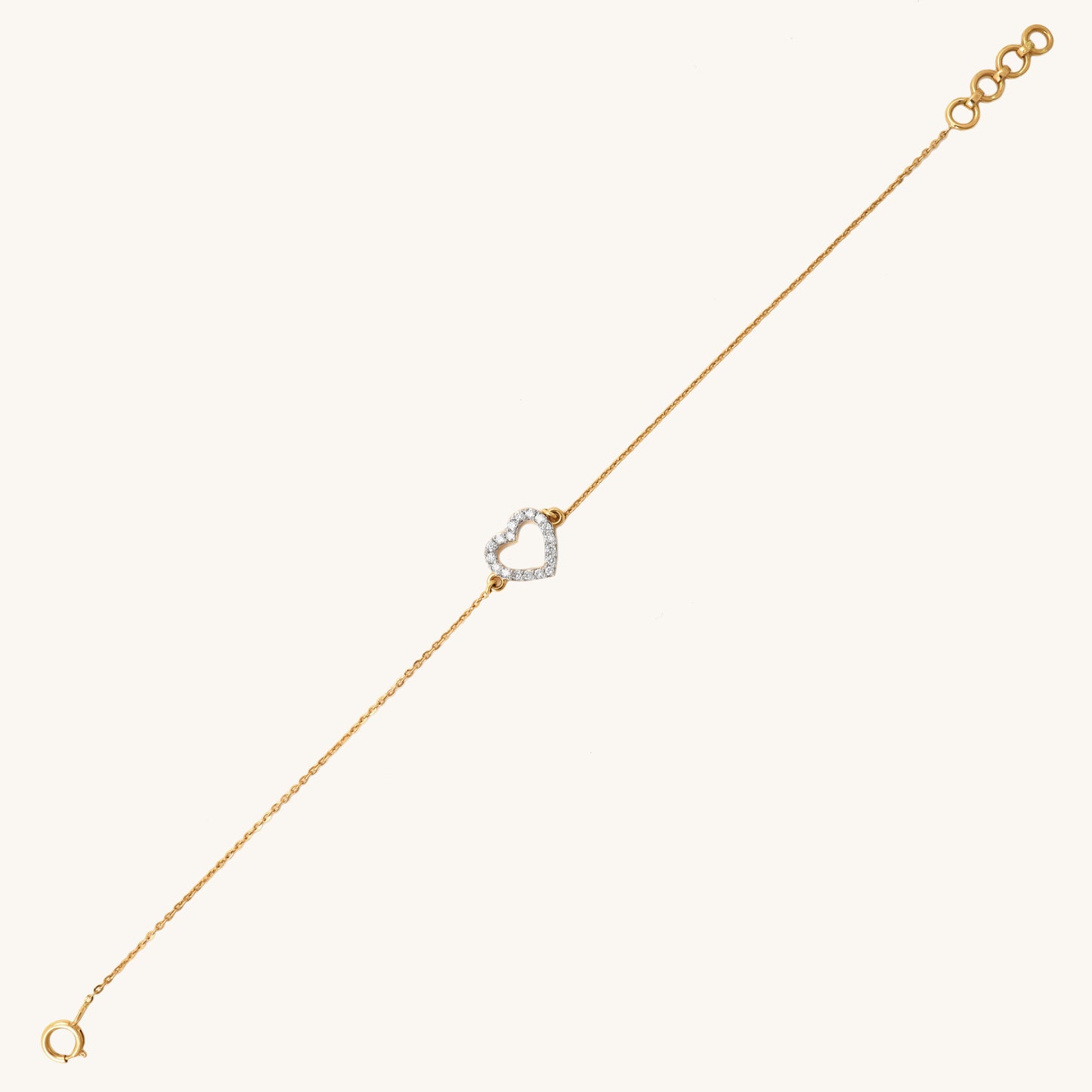 Caratly 18kt gold Heart Diamond Bracelet with 0.13ct diamond pave open heart outline charm on a delicate chain under Rs. 40,000