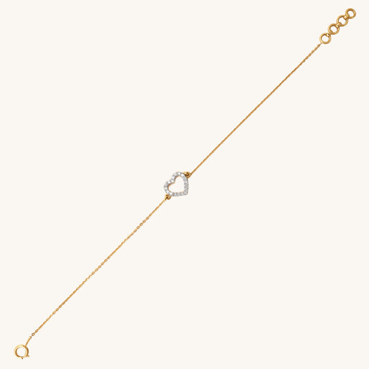 Caratly 18kt gold Heart Diamond Bracelet with 0.13ct diamond pave open heart outline charm on a delicate chain under Rs. 40,000