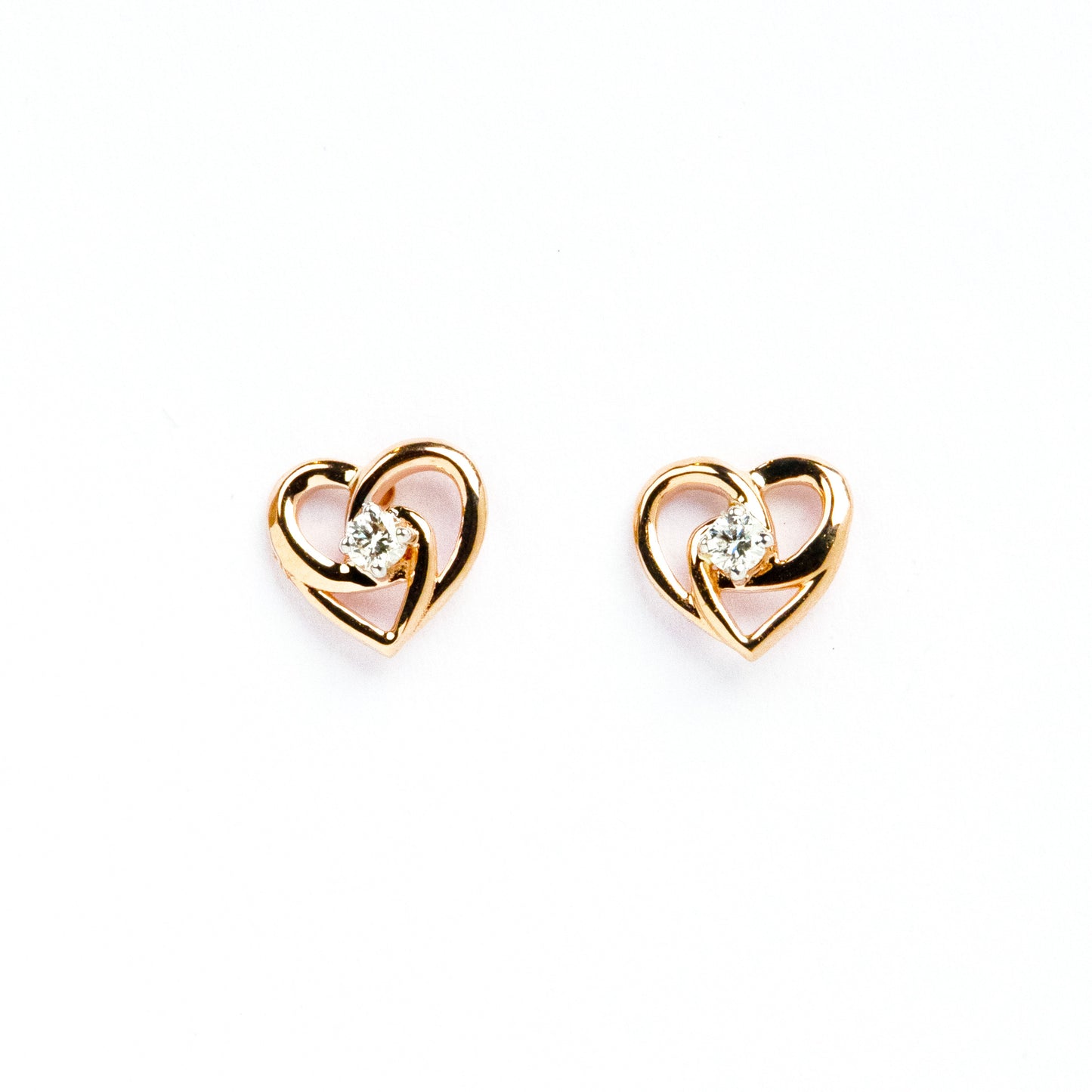 Caratly 18kt gold Heart Linked Earring with 0.07ct diamonds in an intertwined double heart stud design under Rs. 30,000