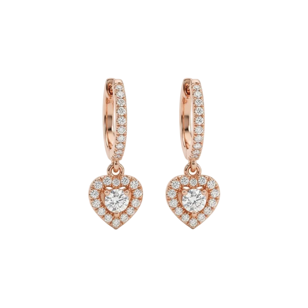 Rose gold huggie hoop earrings with a dangling pave diamond heart charm. Luxe and elegant gifts under Rs. 80,000