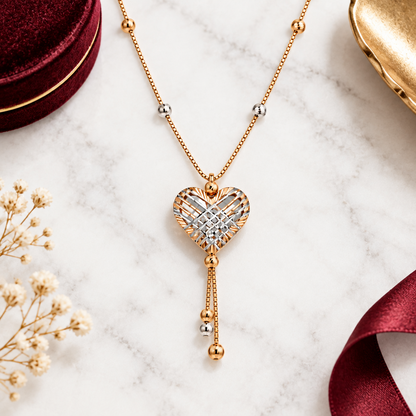 Rose gold heart-shaped pendant with a woven diamond cage design and dangling bead accents. Luxe gifts for her under Rs. 80,000