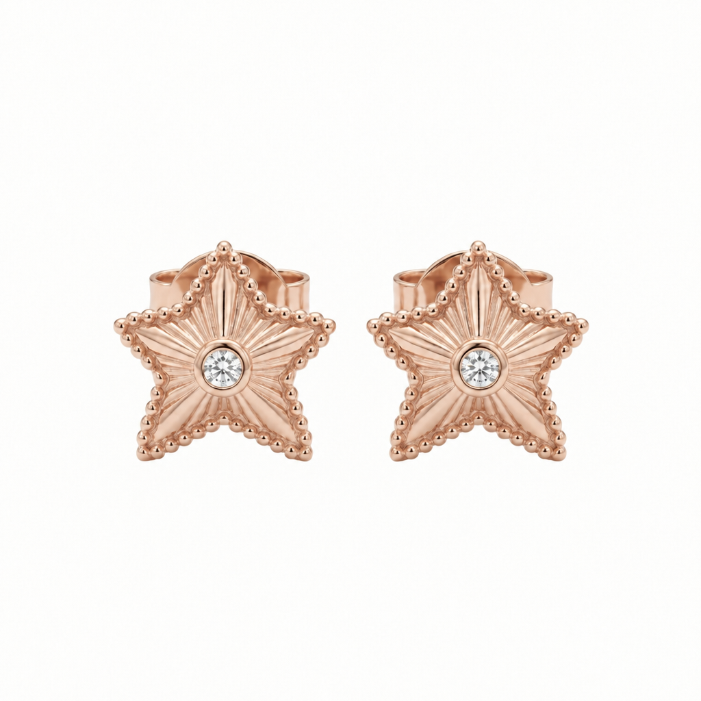 Rose gold textured star stud earrings with a sparkling stone at center. Priced under Rs. 35,000
