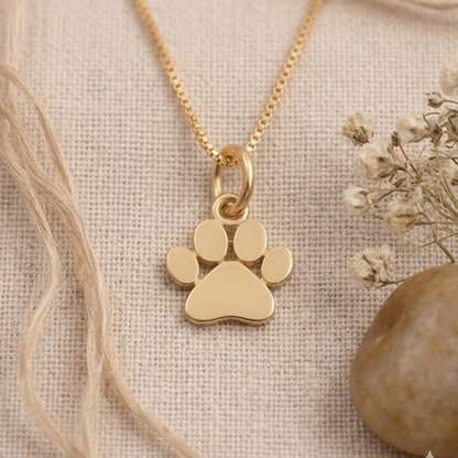 Caratly 18kt gold Paw Gold Pendant featuring a small, polished solid gold paw print charm on a delicate chain under Rs. 15,000