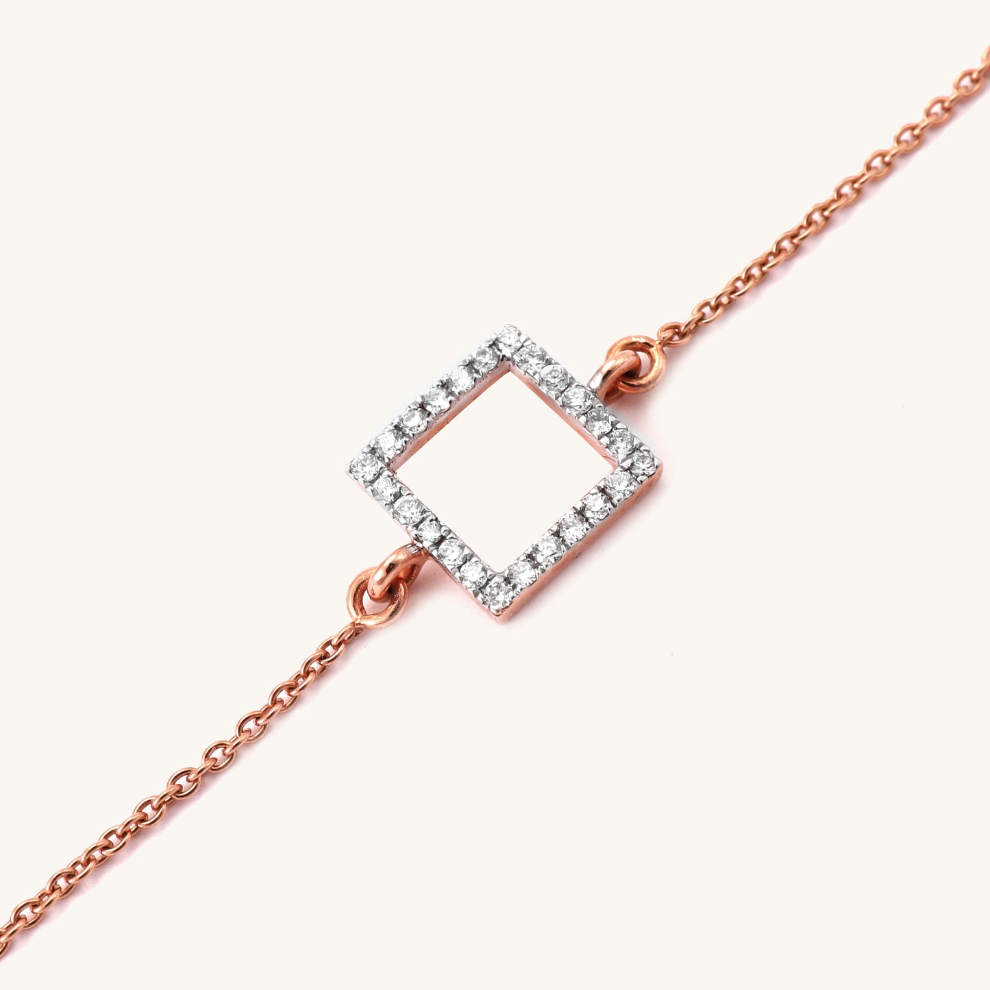 18kt gold open square diamond bracelet. Affordable diamond bracelet for gift under Rs. 30,000.