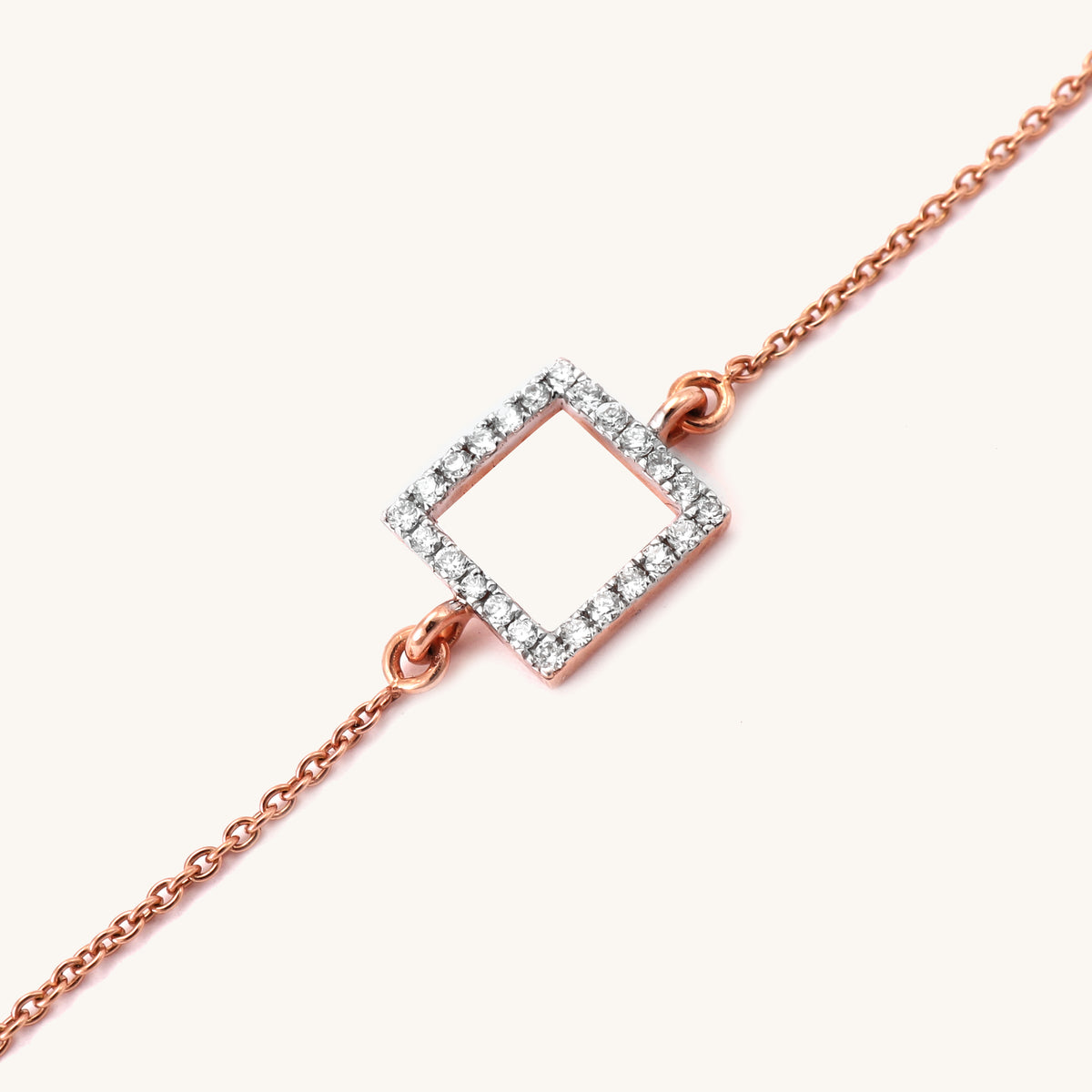 18kt gold open square diamond bracelet. Affordable diamond bracelet for gift under Rs. 30,000.