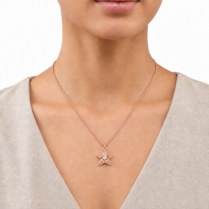 Rose gold starfish pendant necklace encrusted with sparkling stone priced under Rs. 70,000