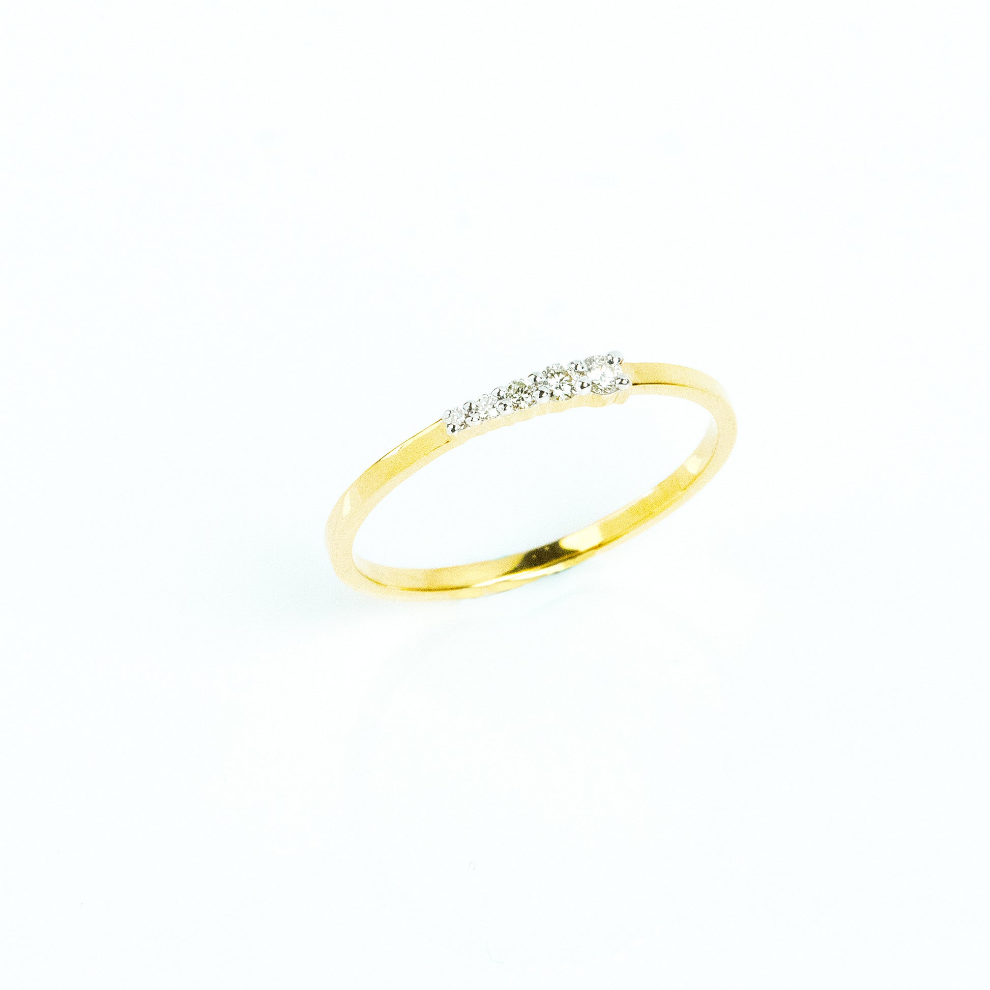 Caratly 18kt gold Diamond Flow Ring with 0.09ct graduated diamond row design minimalist band under Rs. 30,000