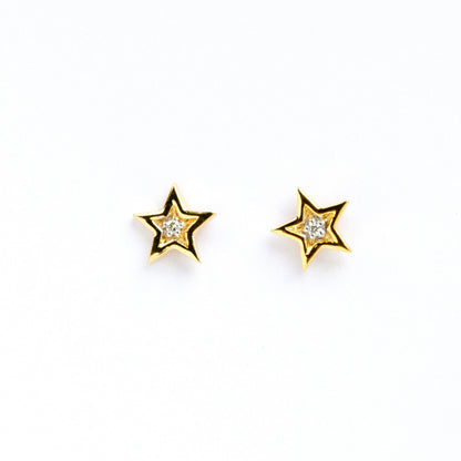 Caratly 18kt gold Star Diamond Earring with 0.02ct diamond center in a five-pointed star stud design. Perfect for gifting it to her under Rs. 20,000