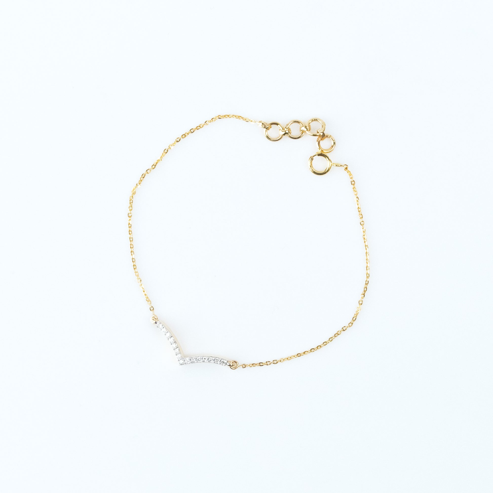 Caratly 18kt gold Stylish Diamond Bracelet with 0.09ct diamond chevron V-shape design, minimalist and trendy design under 40,000